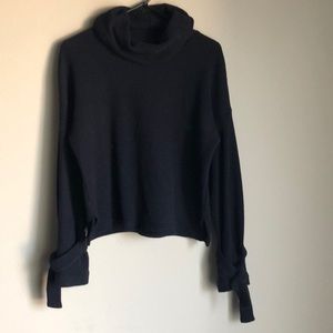 Tie sleeve turtleneck